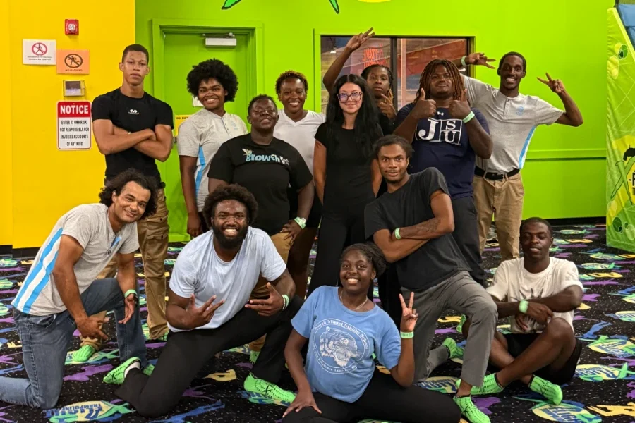 Group of people posing together at X Flight Trampoline Park.